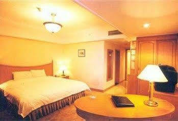 Jin'Gu Hotel Харбін Номер фото